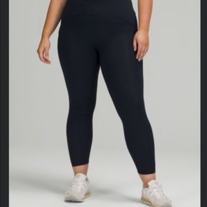 Lululemon power through high rise tight size 10. Navy